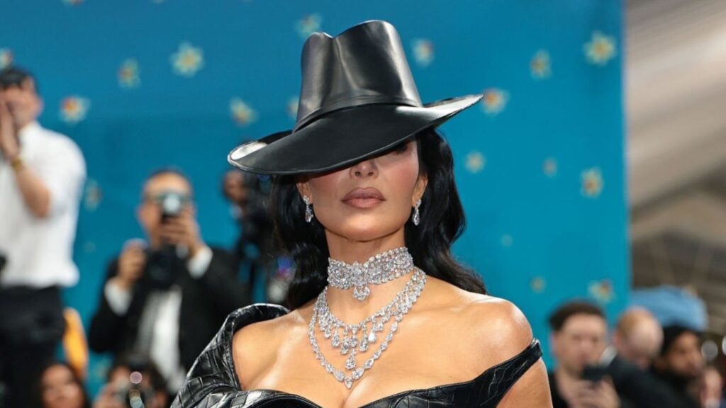 Kim Kardashian's awkward response caught on camera as security guard stumbles on her 2025 Met Gala dress, creating an unforgettable moment