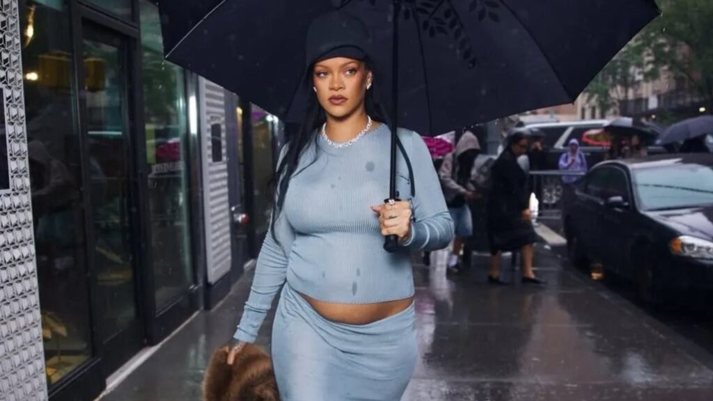Rihanna reveals her pregnancy in a radiant Met Gala appearance with A$AP Rocky, creating an iconic and unforgettable fashion moment