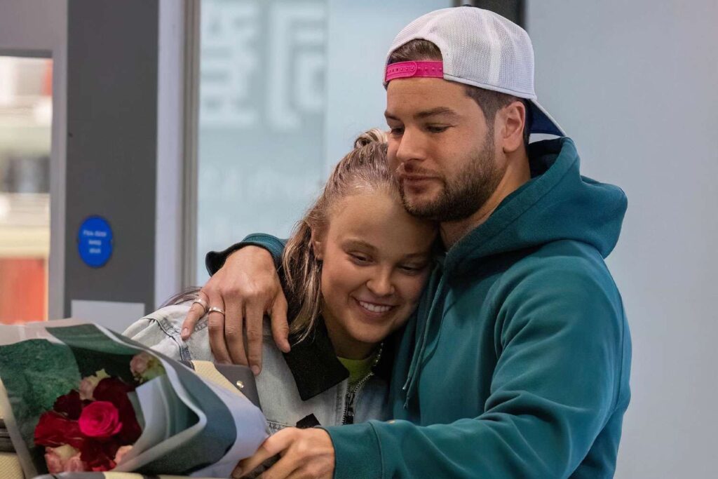 JoJo Siwa and Chris Hughes posted a photo of themselves cuddled up in bed. Photo: People