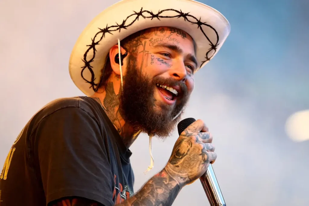 Post Malone's tour took a dramatic turn when he fell off the stage mid-performance while trying to toast a front-row fan. Photo: Hytrape.com
